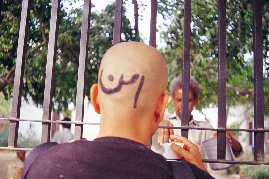 Inder Salim, On the Fall of Iraq. Performance, Sahmat Event, Delhi (2003). Photo courtesy of Umesh Kaushik.